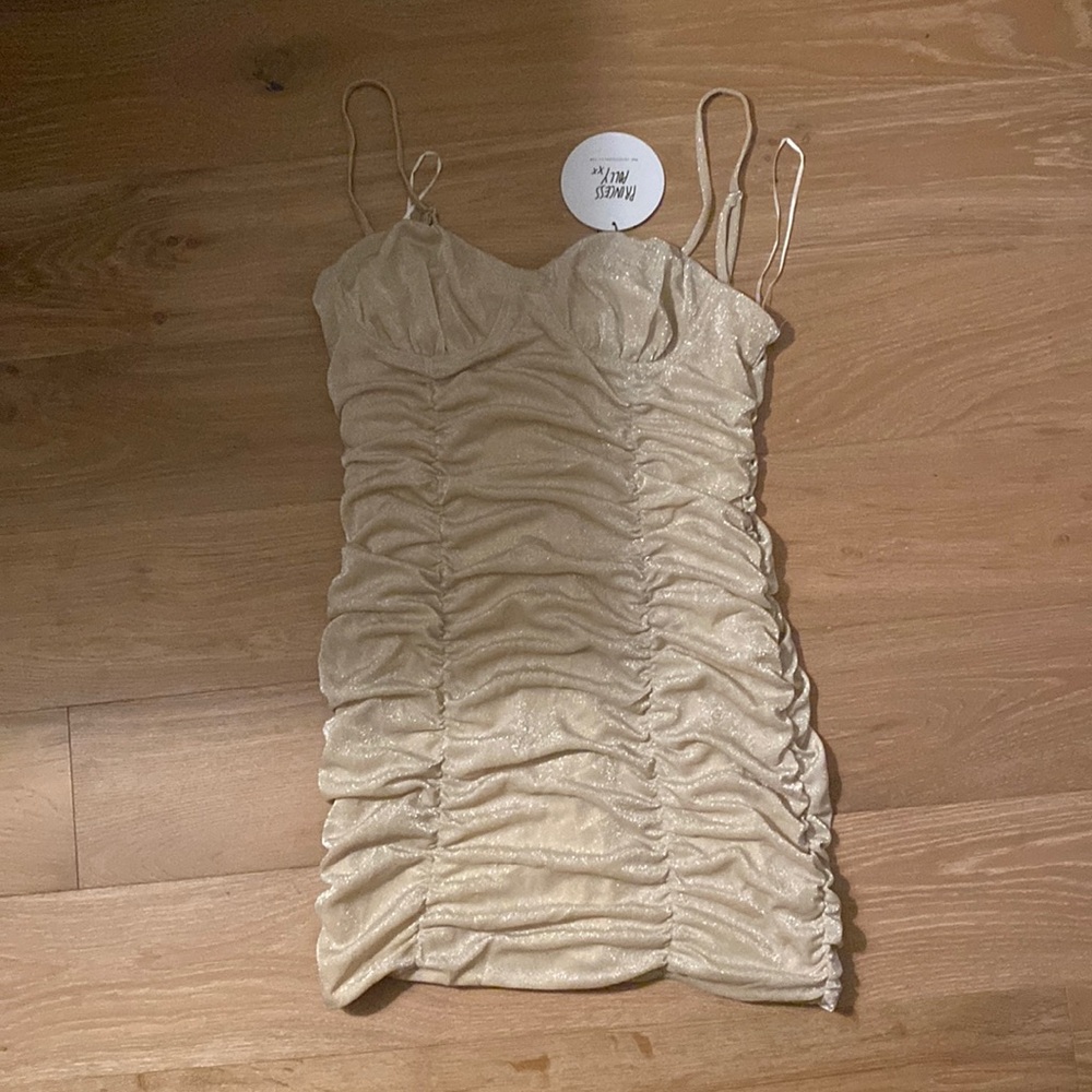 champagne colored mini dress with sparkles
